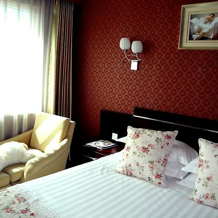 Overseas Chinese International Hotel Qingdao Buitenkant foto