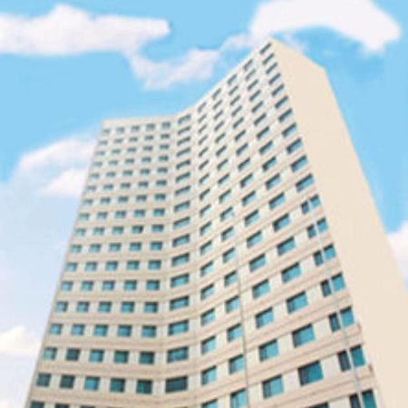 Overseas Chinese International Hotel Qingdao Buitenkant foto