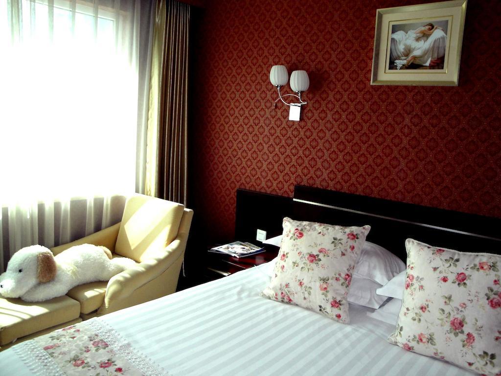 Overseas Chinese International Hotel Qingdao Buitenkant foto