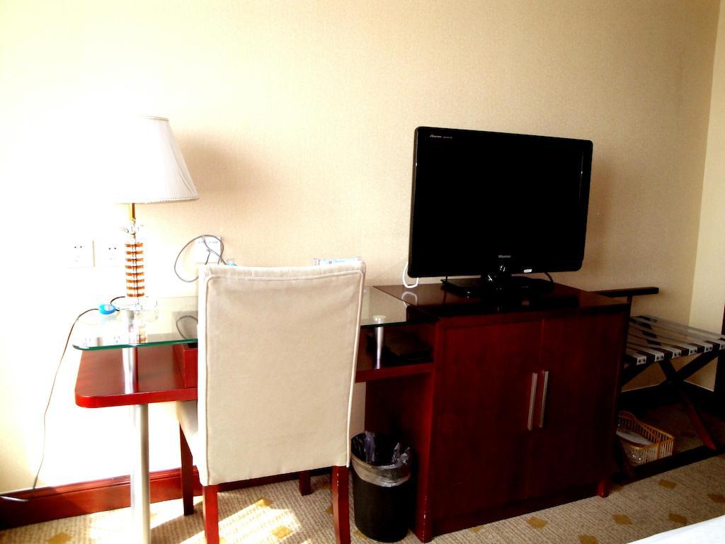 Overseas Chinese International Hotel Qingdao Buitenkant foto