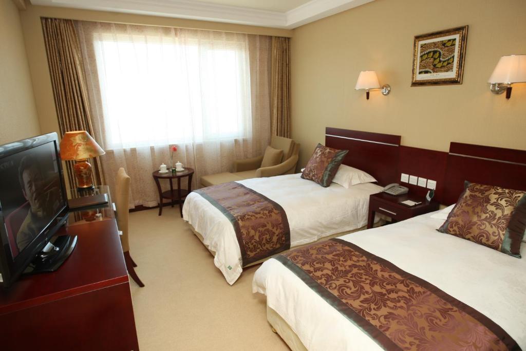 Overseas Chinese International Hotel Qingdao Buitenkant foto