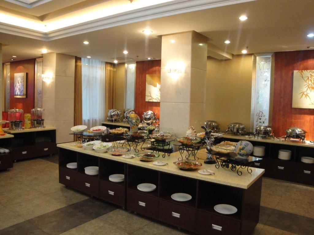 Overseas Chinese International Hotel Qingdao Buitenkant foto