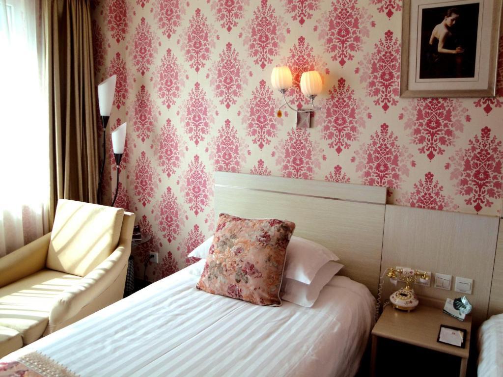 Overseas Chinese International Hotel Qingdao Kamer foto