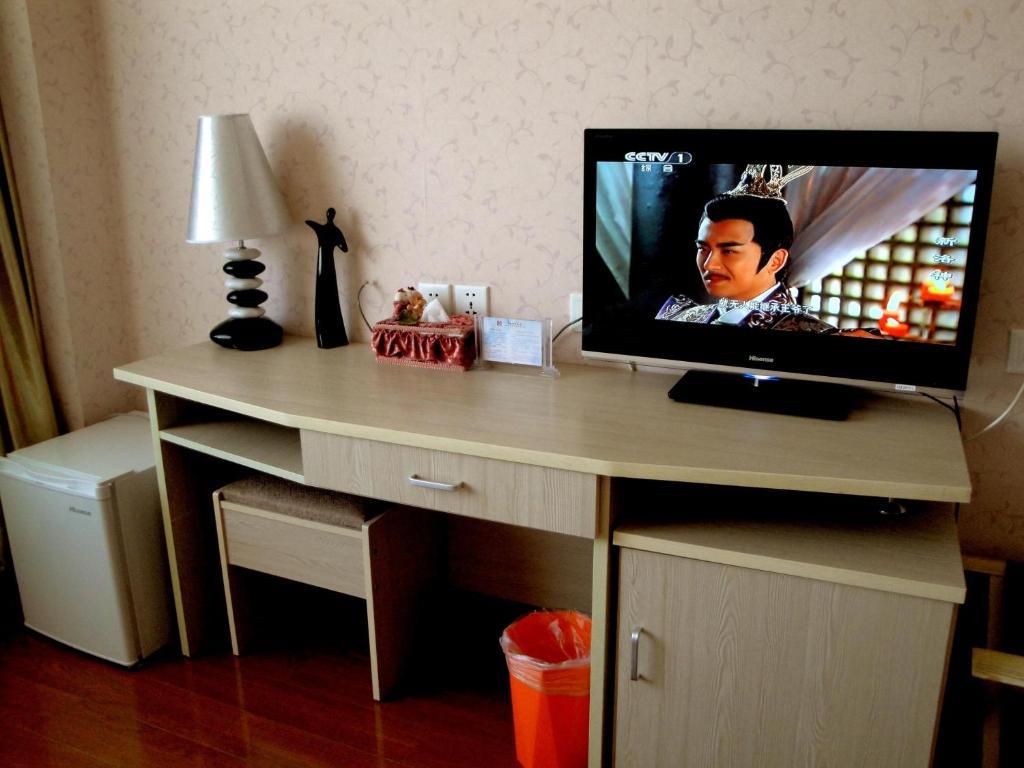 Overseas Chinese International Hotel Qingdao Kamer foto