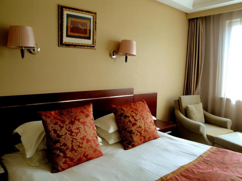 Overseas Chinese International Hotel Qingdao Kamer foto